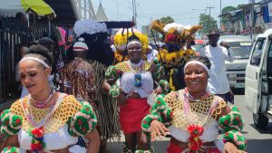 Traditional dance troupe at Watt Market marching towards the Itiat Abasi Orok effigy at the popular Watt Market roundabout